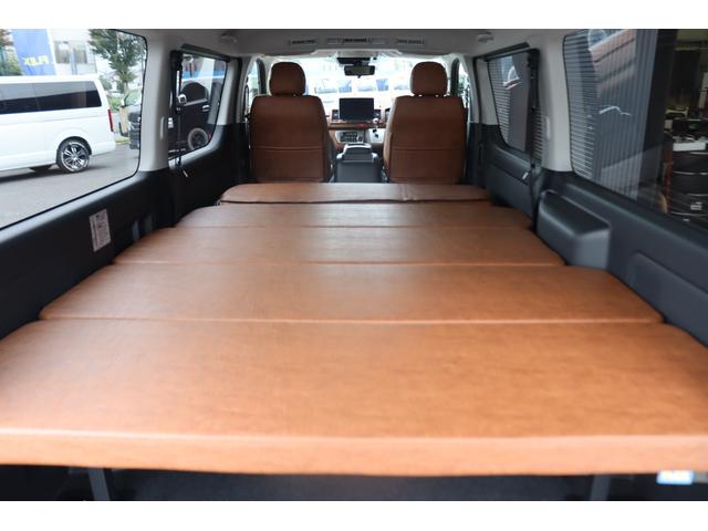 ハイエースバン ロングスーパーGL アースカラーパッケージ ベージュ ガソリン2WD 角目フェイス クラシックテール カリフォルニア16インチAW ナスカータイヤ アルパインナビ 茶木目インパネ ベッドキット シートカバー ETCPVM(51枚目)