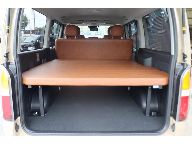 ハイエースバン ロングスーパーGL アースカラーパッケージ ベージュ ガソリン2WD 角目フェイス クラシックテール カリフォルニア16インチAW ナスカータイヤ アルパインナビ 茶木目インパネ ベッドキット シートカバー ETCPVM(54枚目)