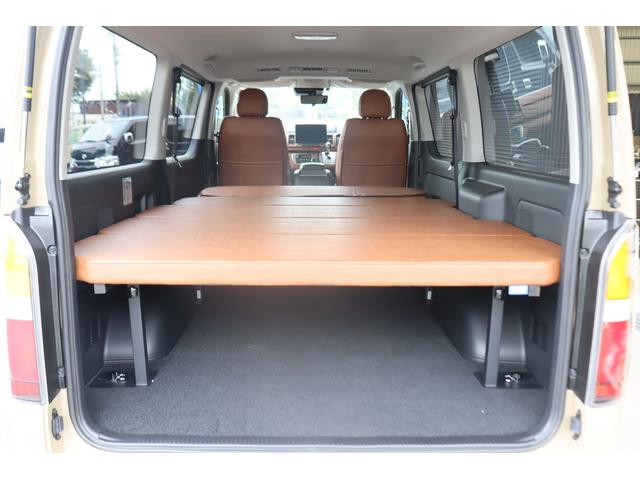 ハイエースバン ロングスーパーGL アースカラーパッケージ ベージュ ガソリン2WD 角目フェイス クラシックテール カリフォルニア16インチAW ナスカータイヤ アルパインナビ 茶木目インパネ ベッドキット シートカバー ETCPVM(55枚目)