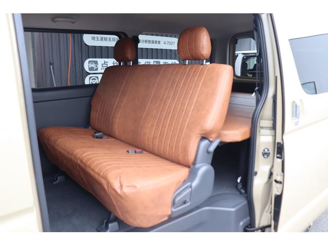 ハイエースバン ロングスーパーGL アースカラーパッケージ ベージュ ガソリン2WD 角目フェイス クラシックテール カリフォルニア16インチAW ナスカータイヤ アルパインナビ 茶木目インパネ ベッドキット シートカバー ETCPVM(64枚目)