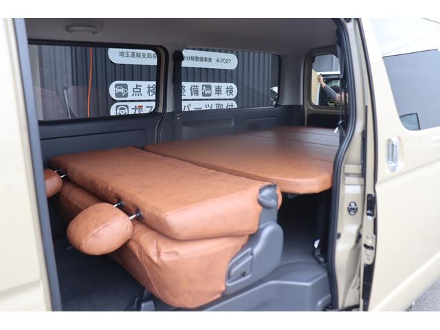 ハイエースバン ロングスーパーGL アースカラーパッケージ ベージュ ガソリン2WD 角目フェイス クラシックテール カリフォルニア16インチAW ナスカータイヤ アルパインナビ 茶木目インパネ ベッドキット シートカバー ETCPVM(65枚目)