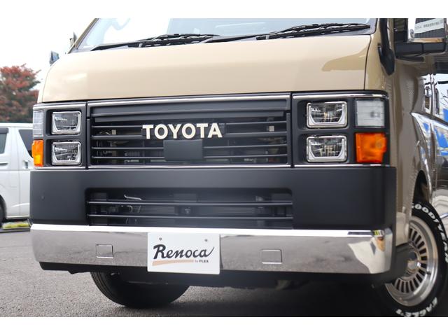 ハイエースバン ロングスーパーGL アースカラーパッケージ ベージュ ガソリン2WD 角目フェイス クラシックテール カリフォルニア16インチAW ナスカータイヤ アルパインナビ 茶木目インパネ ベッドキット シートカバー ETCPVM(71枚目)
