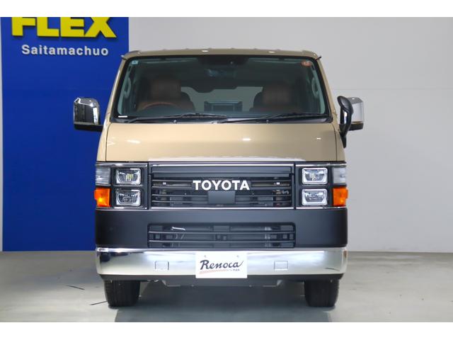 ハイエースバン ロングスーパーGL アースカラーパッケージ ベージュ ガソリン2WD 角目フェイス クラシックテール カリフォルニア16インチAW ナスカータイヤ アルパインナビ 茶木目インパネ ベッドキット シートカバー ETCPVM(72枚目)