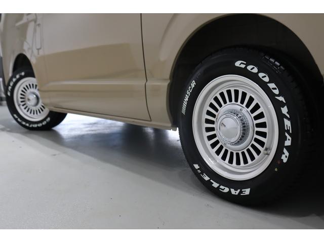ハイエースバン ロングスーパーGL アースカラーパッケージ ベージュ ガソリン2WD 角目フェイス クラシックテール カリフォルニア16インチAW ナスカータイヤ アルパインナビ 茶木目インパネ ベッドキット シートカバー ETCPVM(75枚目)