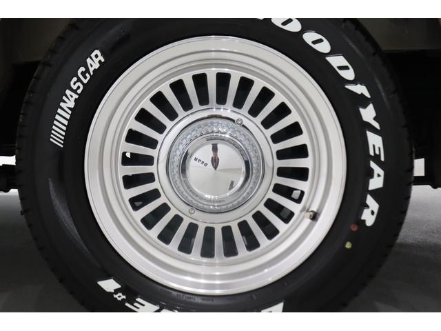 ハイエースバン ロングスーパーGL アースカラーパッケージ ベージュ ガソリン2WD 角目フェイス クラシックテール カリフォルニア16インチAW ナスカータイヤ アルパインナビ 茶木目インパネ ベッドキット シートカバー ETCPVM(76枚目)