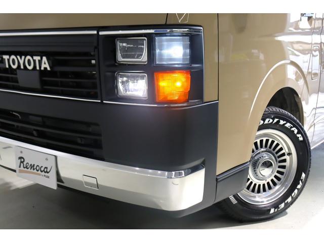 ハイエースバン ロングスーパーGL アースカラーパッケージ ベージュ ガソリン2WD 角目フェイス クラシックテール カリフォルニア16インチAW ナスカータイヤ アルパインナビ 茶木目インパネ ベッドキット シートカバー ETCPVM(80枚目)