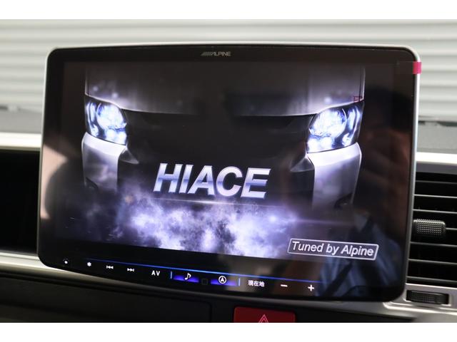 ハイエースワゴン ＧＬ　ロング　内装架装Ｖｅｒ１　フローリング施工　ベットキット　専用テーブル　ＢＩＧＸ１１インチナビ　１０インチフリップダウンモニター　パノラミックビューモニター　デジタルインナーミラー　パワースライドドア（19枚目）