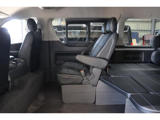 ハイエースワゴン ＧＬ　ロング　内装架装Ｖｅｒ１　フローリング施工　ベットキット　専用テーブル　ＢＩＧＸ１１インチナビ　１０インチフリップダウンモニター　パノラミックビューモニター　デジタルインナーミラー　パワースライドドア（27枚目）