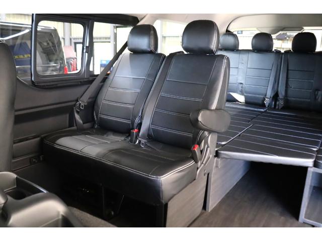 ハイエースワゴン ＧＬ　ロング　内装架装Ｖｅｒ１　フローリング施工　ベットキット　専用テーブル　ＢＩＧＸ１１インチナビ　１０インチフリップダウンモニター　パノラミックビューモニター　デジタルインナーミラー　パワースライドドア（28枚目）