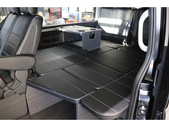 ハイエースワゴン ＧＬ　ロング　内装架装Ｖｅｒ１　フローリング施工　ベットキット　専用テーブル　ＢＩＧＸ１１インチナビ　１０インチフリップダウンモニター　パノラミックビューモニター　デジタルインナーミラー　パワースライドドア（29枚目）