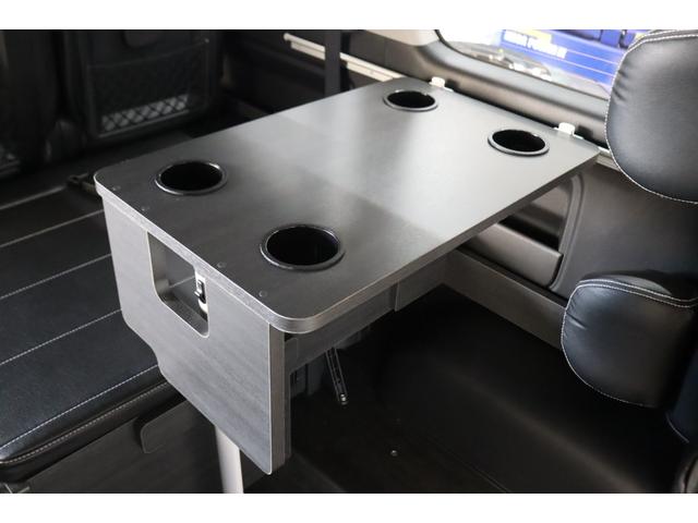 ハイエースワゴン ＧＬ　ロング　内装架装Ｖｅｒ１　フローリング施工　ベットキット　専用テーブル　ＢＩＧＸ１１インチナビ　１０インチフリップダウンモニター　パノラミックビューモニター　デジタルインナーミラー　パワースライドドア（38枚目）