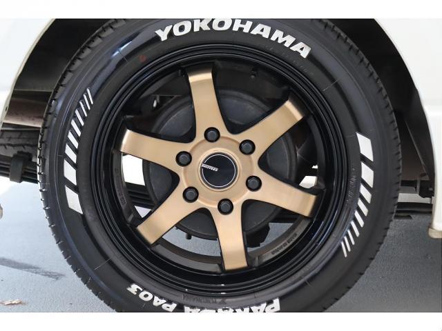 ハイエースワゴン GL 内装架装アレンジS ロングスライドシート搭載 フルフラット/対面対座OK アルパイン8インチナビ/フリップダウンモニター パワースライドドア 2インチダウン バットフェイスボンネット 17インチAW(18枚目)