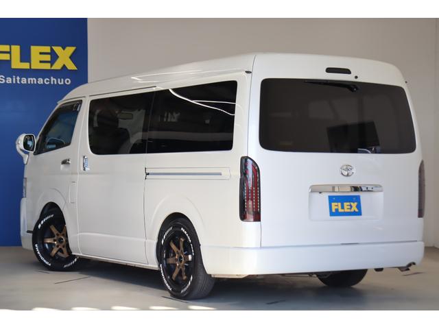 ハイエースワゴン GL 内装架装アレンジS ロングスライドシート搭載 フルフラット/対面対座OK アルパイン8インチナビ/フリップダウンモニター パワースライドドア 2インチダウン バットフェイスボンネット 17インチAW(23枚目)