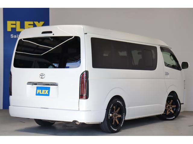 ハイエースワゴン GL 内装架装アレンジS ロングスライドシート搭載 フルフラット/対面対座OK アルパイン8インチナビ/フリップダウンモニター パワースライドドア 2インチダウン バットフェイスボンネット 17インチAW(25枚目)