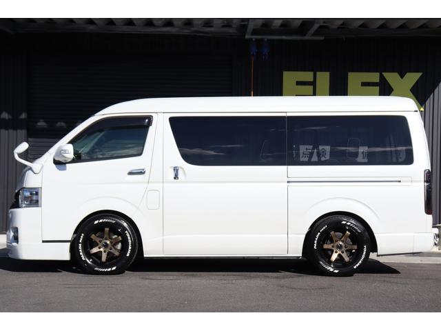 ハイエースワゴン GL 内装架装アレンジS ロングスライドシート搭載 フルフラット/対面対座OK アルパイン8インチナビ/フリップダウンモニター パワースライドドア 2インチダウン バットフェイスボンネット 17インチAW(27枚目)