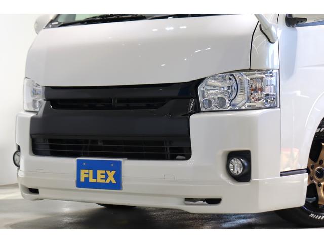 ハイエースワゴン GL 内装架装アレンジS ロングスライドシート搭載 フルフラット/対面対座OK アルパイン8インチナビ/フリップダウンモニター パワースライドドア 2インチダウン バットフェイスボンネット 17インチAW(28枚目)