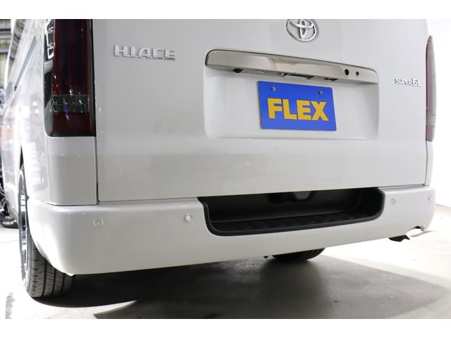 ハイエースバン スーパーＧＬ　ダークプライムＩＩ　床張り施工済み　ベッドキット　パノラミックビューモニター／クリアランスソナー　デジタルインナーミラー　パワースライドドア　ＢＩＧＸ１１インチメカレスナビ　ＨＤＭＩ端子　ＥＴＣ　モデリスタエアロ（35枚目）