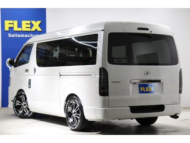 ハイエースバン スーパーＧＬ　ダークプライムＩＩワイド　ロングボディ　ＢＩＧ－Ｘ１１インチ　両側自動ドア　トヨタセーフティー　ＦＬＥＸフロントエアロ／オーバーフェンダー　１．５インチローダウン　ＤＥＬＦ０２　１７インチＡＷ／ナスカータイヤ　アルティメット２ＬＥＤテール（24枚目）