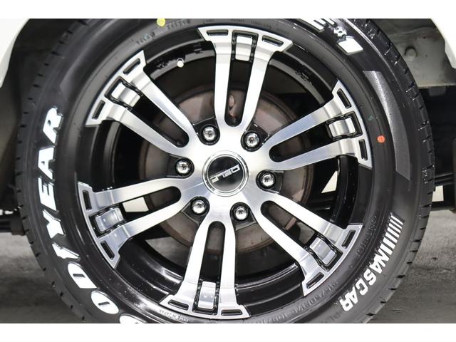 ハイエースバン スーパーＧＬ　ダークプライムＩＩワイド　ロングボディ　ＢＩＧ－Ｘ１１インチ　両側自動ドア　トヨタセーフティー　ＦＬＥＸフロントエアロ／オーバーフェンダー　１．５インチローダウン　ＤＥＬＦ０２　１７インチＡＷ／ナスカータイヤ　アルティメット２ＬＥＤテール（27枚目）