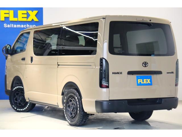 ハイエースバン ロングスーパーGL アースカラーパッケージ ブラックエディション仕様/オフロードパッケージ BIG-X11インチナビ 高さ調整式ベットキット フロントエアロ オーバーフェンダー LEDテール NT-1アルミ ダンロップ(26枚目)