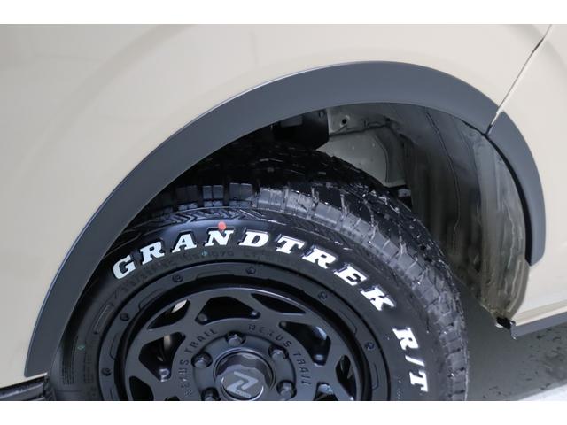 ハイエースバン ロングスーパーGL アースカラーパッケージ ブラックエディション仕様/オフロードパッケージ BIG-X11インチナビ 高さ調整式ベットキット フロントエアロ オーバーフェンダー LEDテール NT-1アルミ ダンロップ(32枚目)