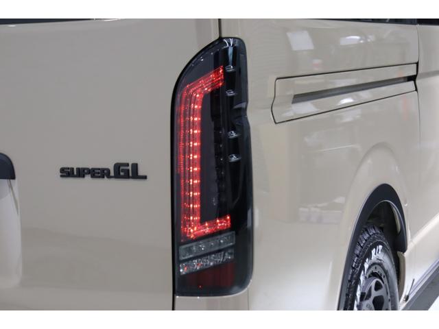 ハイエースバン ロングスーパーGL アースカラーパッケージ ブラックエディション仕様/オフロードパッケージ BIG-X11インチナビ 高さ調整式ベットキット フロントエアロ オーバーフェンダー LEDテール NT-1アルミ ダンロップ(36枚目)