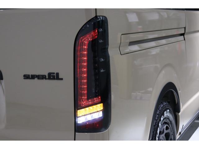 ハイエースバン ロングスーパーGL アースカラーパッケージ ブラックエディション仕様/オフロードパッケージ BIG-X11インチナビ 高さ調整式ベットキット フロントエアロ オーバーフェンダー LEDテール NT-1アルミ ダンロップ(38枚目)