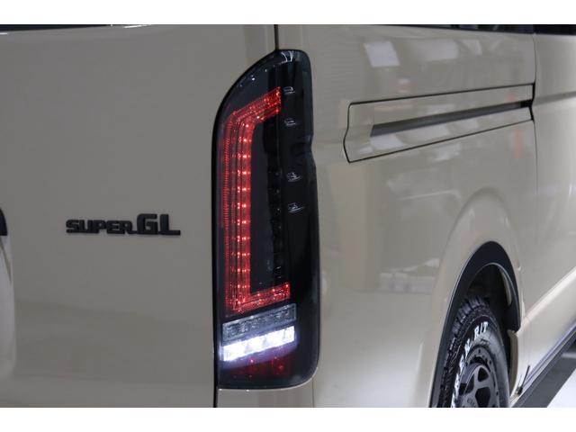 ハイエースバン ロングスーパーGL アースカラーパッケージ ブラックエディション仕様/オフロードパッケージ BIG-X11インチナビ 高さ調整式ベットキット フロントエアロ オーバーフェンダー LEDテール NT-1アルミ ダンロップ(39枚目)