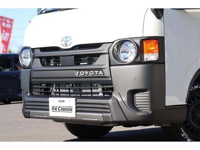 ハイエースバン ロングＤＸ　新車　ＤＸ　ガソリン２ＷＤ　丸目　Ｒｅグリル　Ｔ－ＦＯＲＣＥ　ＮＣ－１／１６インチＡＷ　ダンロップ　オーバーフェンダー　クラシックテール　アルパインナビ　ＨＤＭＩ　ベッド　シートカバー　デジタルミラー（16枚目）