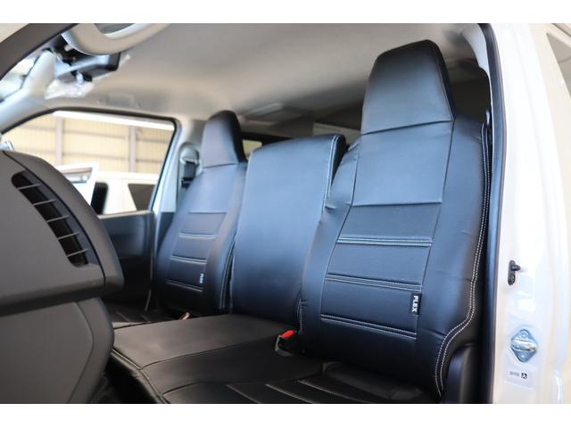 ハイエースバン ロングＤＸ　新車　ＤＸ　ガソリン２ＷＤ　丸目　Ｒｅグリル　Ｔ－ＦＯＲＣＥ　ＮＣ－１／１６インチＡＷ　ダンロップ　オーバーフェンダー　クラシックテール　アルパインナビ　ＨＤＭＩ　ベッド　シートカバー　デジタルミラー（34枚目）