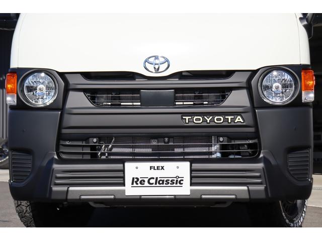 ハイエースバン ロングＤＸ　新車　ＤＸ　ガソリン２ＷＤ　丸目　Ｒｅグリル　Ｔ－ＦＯＲＣＥ　ＮＣ－１／１６インチＡＷ　ダンロップ　オーバーフェンダー　クラシックテール　アルパインナビ　ＨＤＭＩ　ベッド　シートカバー　デジタルミラー（50枚目）
