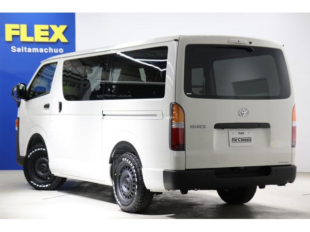 ハイエースバン ロングＤＸ　新車　ＤＸ　ガソリン２ＷＤ　丸目　Ｒｅグリル　Ｔ－ＦＯＲＣＥ　ＮＣ－１／１６インチＡＷ　ダンロップ　オーバーフェンダー　クラシックテール　アルパインナビ　ＨＤＭＩ　ベッド　シートカバー　デジタルミラー（58枚目）