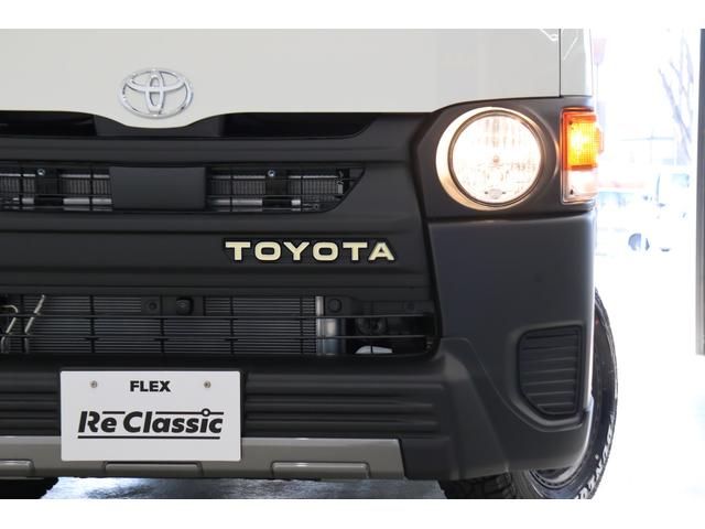 ハイエースバン ロングＤＸ　新車　ＤＸ　ガソリン２ＷＤ　丸目　Ｒｅグリル　Ｔ－ＦＯＲＣＥ　ＮＣ－１／１６インチＡＷ　ダンロップ　オーバーフェンダー　クラシックテール　アルパインナビ　ＨＤＭＩ　ベッド　シートカバー　デジタルミラー（70枚目）