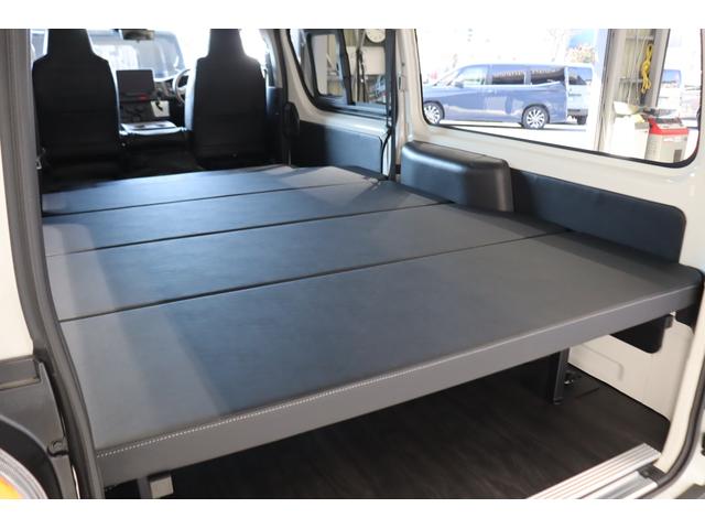 ハイエースバン ロングＤＸ　新車　ＤＸ　ガソリン２ＷＤ　丸目　Ｒｅグリル　Ｔ－ＦＯＲＣＥ　ＮＣ－１／１６インチＡＷ　ダンロップ　オーバーフェンダー　クラシックテール　アルパインナビ　ＨＤＭＩ　ベッド　シートカバー　デジタルミラー（78枚目）