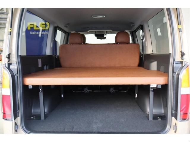 ハイエースバン ロングスーパーＧＬ　ガソリン２ＷＤ　アースカラー　ベージュ　ブラックエディション　バンパー同色　ＮＴ－１　１６インチＡＷ　クラシックＬＥＤテール　オーバーフェンダー　シートカバー　ベッド　パノラミックビューモニター（3枚目）
