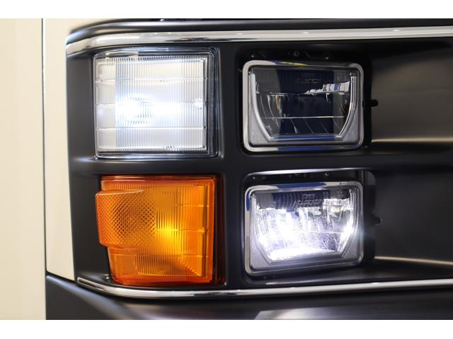 ハイエースバン ロングワイドスーパーＧＬ　ワイドバン　ガソリン２ＷＤ　角目四灯　ＬＥＤ仕様　Ｆバンパーメッキラッピング　ＢＪメキシカン１６インチＡＷ　ナスカータイヤ　クラシックテール　ベッド　クラシックシートカバー　７インチナビ　ＥＴＣ（67枚目）