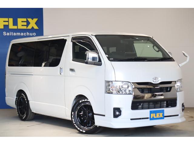 ハイエースバン スーパーGL ダークプライムII ダークプライムII ディーゼル2WD DELF04/17インチAW ナスカータイヤ アルティメットテール フロントエアロ オーバーフェンダー ローダウン アルパインナビ ETC PVM デジタルミラー(68枚目)