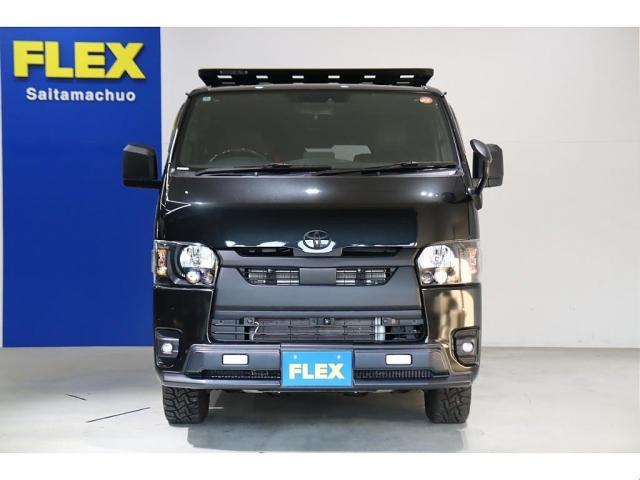 ハイエースバン スーパーＧＬ　ダークプライムＩＩ　ブラックエディション　ネオトレイステール　オーオウンカントリー　１６インチＡＷ　フロントエアロ　ライノラック　オーバーフェンダー　フルセグナビ　ルースピ　ベッド　シートカバー　スライドフロア　カーテン（12枚目）