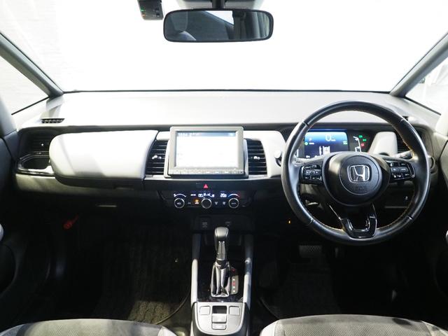 フィット e:HEVRS 純正ナビ 前後ドラレコ ホンダセンシング コーナーセンサー エアバッグ パワーウィンドウ 助手席エアバッグ Dレコ LEDヘッドランプ セキュリティアラーム フルオートエアコン ETC装備 スマートキ(6枚目)
