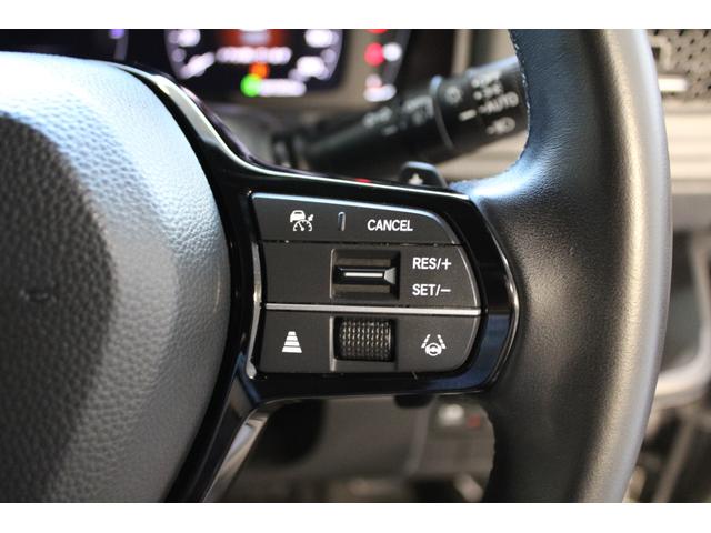 ステップワゴン e:HEVスパーダ ワンオーナー 両側電動スライドドア シートヒーター ブラインドスポットモニター オットマン パドルシフト 純正アルミ LEDヘッドライト オートリトラミラー 1オーナー デュアルエアコン ESC(12枚目)