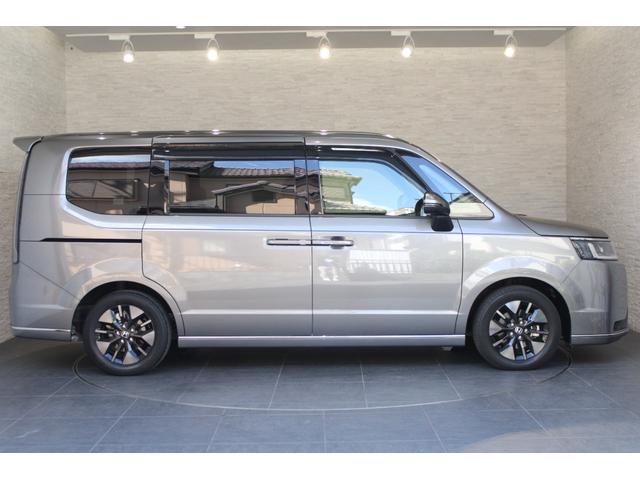 ステップワゴン e:HEVスパーダ ワンオーナー 両側電動スライドドア シートヒーター ブラインドスポットモニター オットマン パドルシフト 純正アルミ LEDヘッドライト オートリトラミラー 1オーナー デュアルエアコン ESC(27枚目)