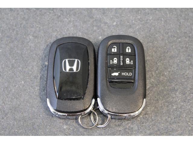 ステップワゴン e:HEVスパーダ ワンオーナー 両側電動スライドドア シートヒーター ブラインドスポットモニター オットマン パドルシフト 純正アルミ LEDヘッドライト オートリトラミラー 1オーナー デュアルエアコン ESC(35枚目)