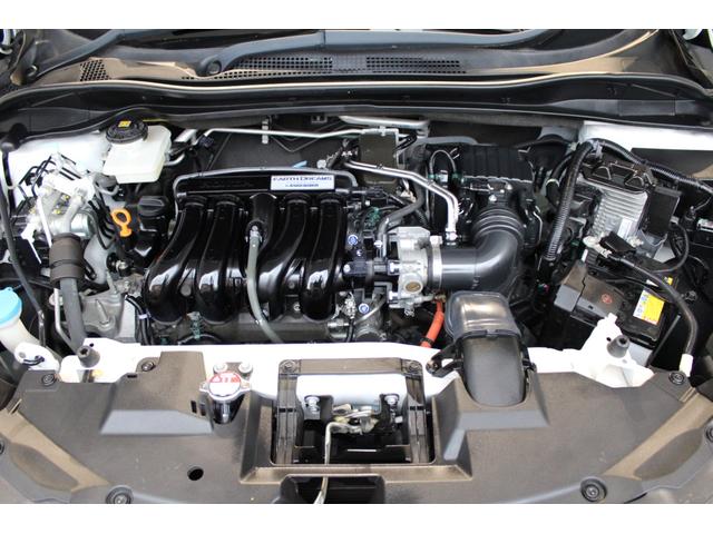 ヴェゼル ハイブリッドＺ・ホンダセンシング　ワンオーナー　フルセグ　バックカメラ　ＥＴＣ　メモリーナビ　電子パーキング　純正アルミホイール　Ｂｌｕｅｔｏｏｔｈ　パドルシフト　レーダーサポート　ＤＶＤ再生機能　整備記録簿　横滑り防止システム（30枚目）