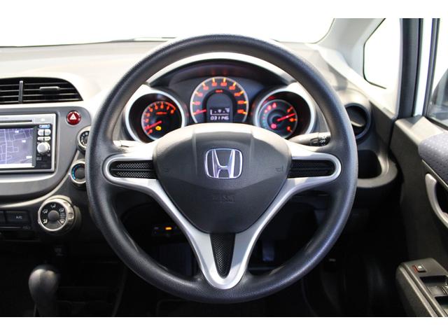 フィット Gスマートセレクション ワンオーナー 純正ナビ バックカメラ ETC HIDライト スマートキー CD SD USB エアバック Wエアーバック 記録簿 パワーウィンドウ 1オーナー車 ABS パワステ エアコン ECON(7枚目)