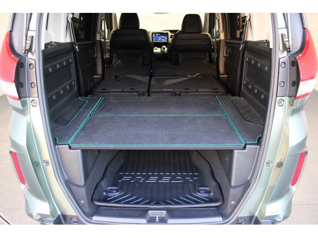 フリード+ハイブリッド ハイブリッド・クロスター ワンオーナー 純正ナビ フルセグ ドラレコ バックカメラ 両側電動スライドドア ETC コーナーセンサー シートヒーター 純正アルミ 衝突軽減ブレーキ スマートキー シ-トヒ-タ- Rカメラ VSA(24枚目)