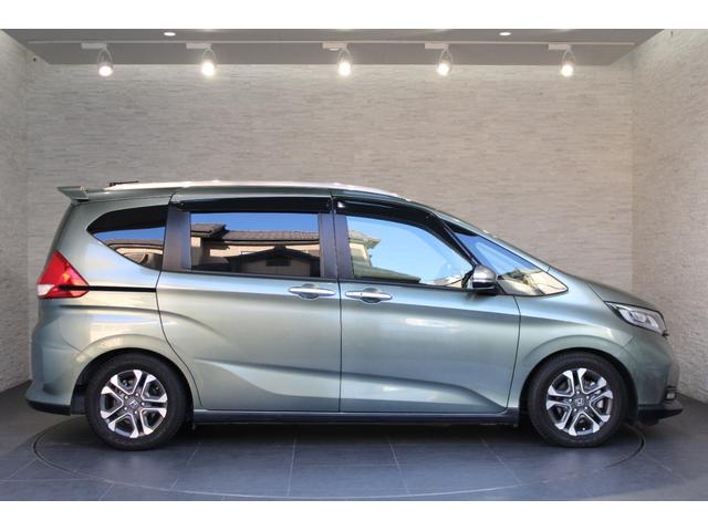 フリード+ハイブリッド ハイブリッド・クロスター ワンオーナー 純正ナビ フルセグ ドラレコ バックカメラ 両側電動スライドドア ETC コーナーセンサー シートヒーター 純正アルミ 衝突軽減ブレーキ スマートキー シ-トヒ-タ- Rカメラ VSA(28枚目)