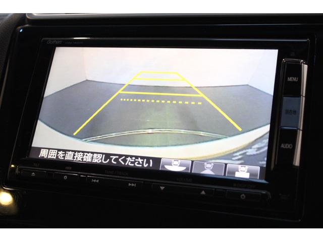 フィット １５Ｘ・Ｌパッケージ　純正ナビ　バックカメラ　フォグライト　ドアバイザー　ＥＴＣ　ステアリングスイッチ　クルーズコントロール　助手席エアバッグ　ＵＳＢ　アイドリングストップ　フルセグＴＶ　スマートキー　フルオートエアコン（5枚目）