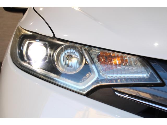 フィット １５Ｘ・Ｌパッケージ　純正ナビ　バックカメラ　フォグライト　ドアバイザー　ＥＴＣ　ステアリングスイッチ　クルーズコントロール　助手席エアバッグ　ＵＳＢ　アイドリングストップ　フルセグＴＶ　スマートキー　フルオートエアコン（10枚目）