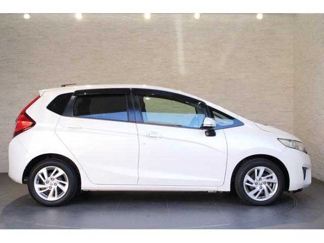 フィット １５Ｘ・Ｌパッケージ　純正ナビ　バックカメラ　フォグライト　ドアバイザー　ＥＴＣ　ステアリングスイッチ　クルーズコントロール　助手席エアバッグ　ＵＳＢ　アイドリングストップ　フルセグＴＶ　スマートキー　フルオートエアコン（21枚目）