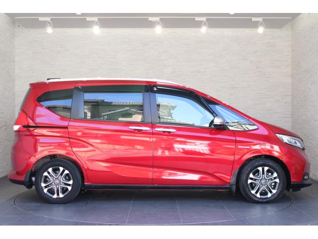 フリード+ハイブリッド ハイブリッド・クロスターホンダセンシング 純正ナビ ドラレコ 両側電動スライドドア フルセグ バックカメラ ETC シートヒーター コーナーセンサー Bluetooth 衝突軽減ブレーキ スマートキー 両側電動ドア サイドエアバッグ ソナー(29枚目)